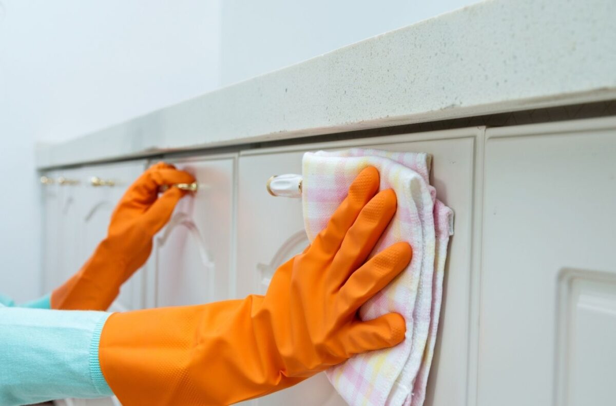 Maid in T.O specialist handling cabinet cleaning in Vaughan kitchen with organized deep cleaning methods. Cabinet Cleaning Near Me.